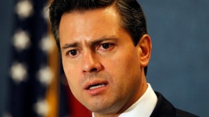 Mexican Gov. Enrique Pena Nieto answers reporters' questions at the National Press Club in Washington November 15, 2011. REUTERS/Molly Riley (UNITED STATES - Tags: POLITICS HEADSHOT) - RTR2U1WP